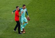 LYON, FRANCE - JULY 06:  Cristiano Ronaldo of Portugal and a ball boy are seen prior to the UEFA EURO 2016 semi final match between Portugal and Wales at Stade des Lumieres on July 6, 2016 in Lyon, France.  (Photo by Clive Rose/Getty Images)